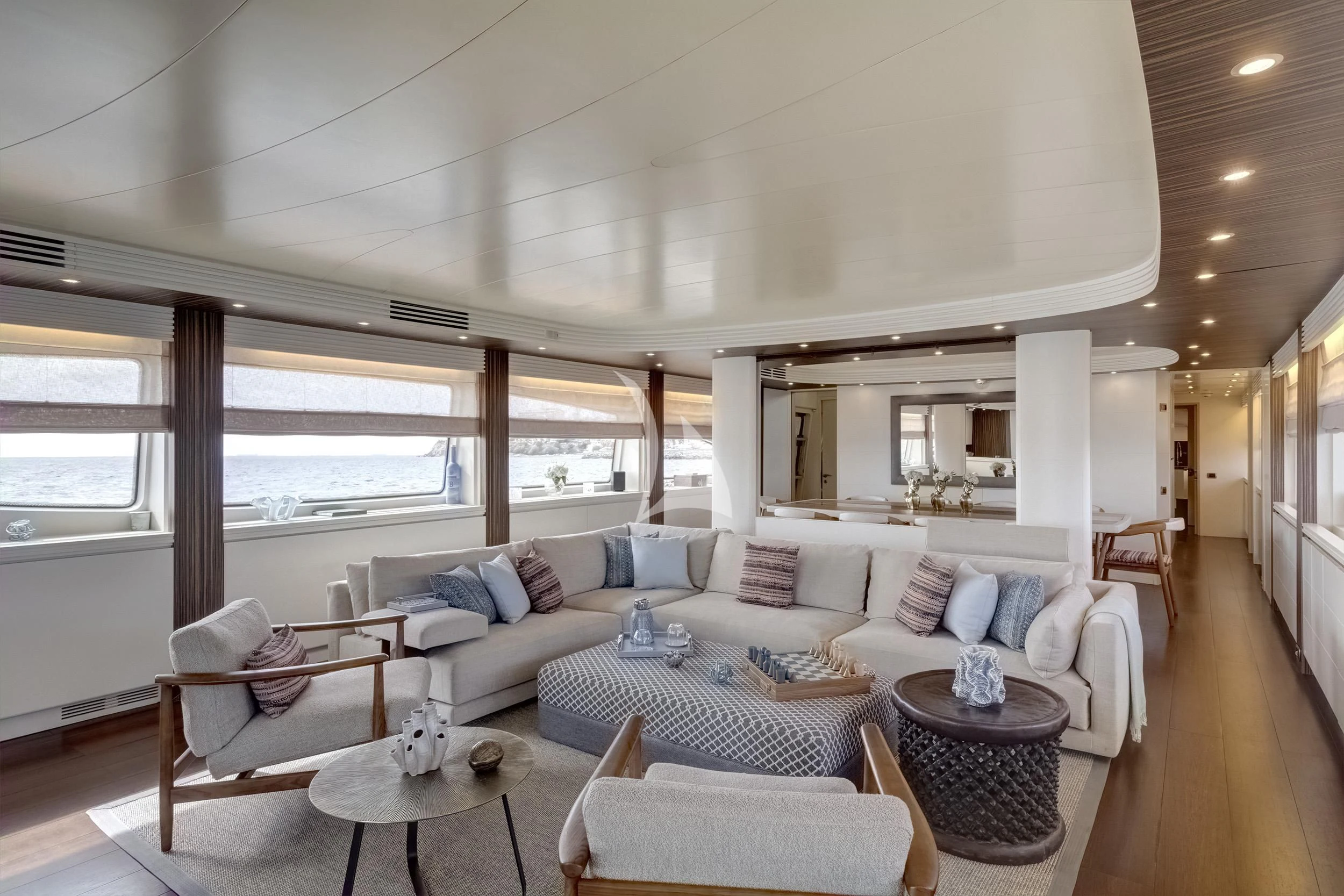 a living room with a couch and a table aboard PAREAKI II Yacht for Sale