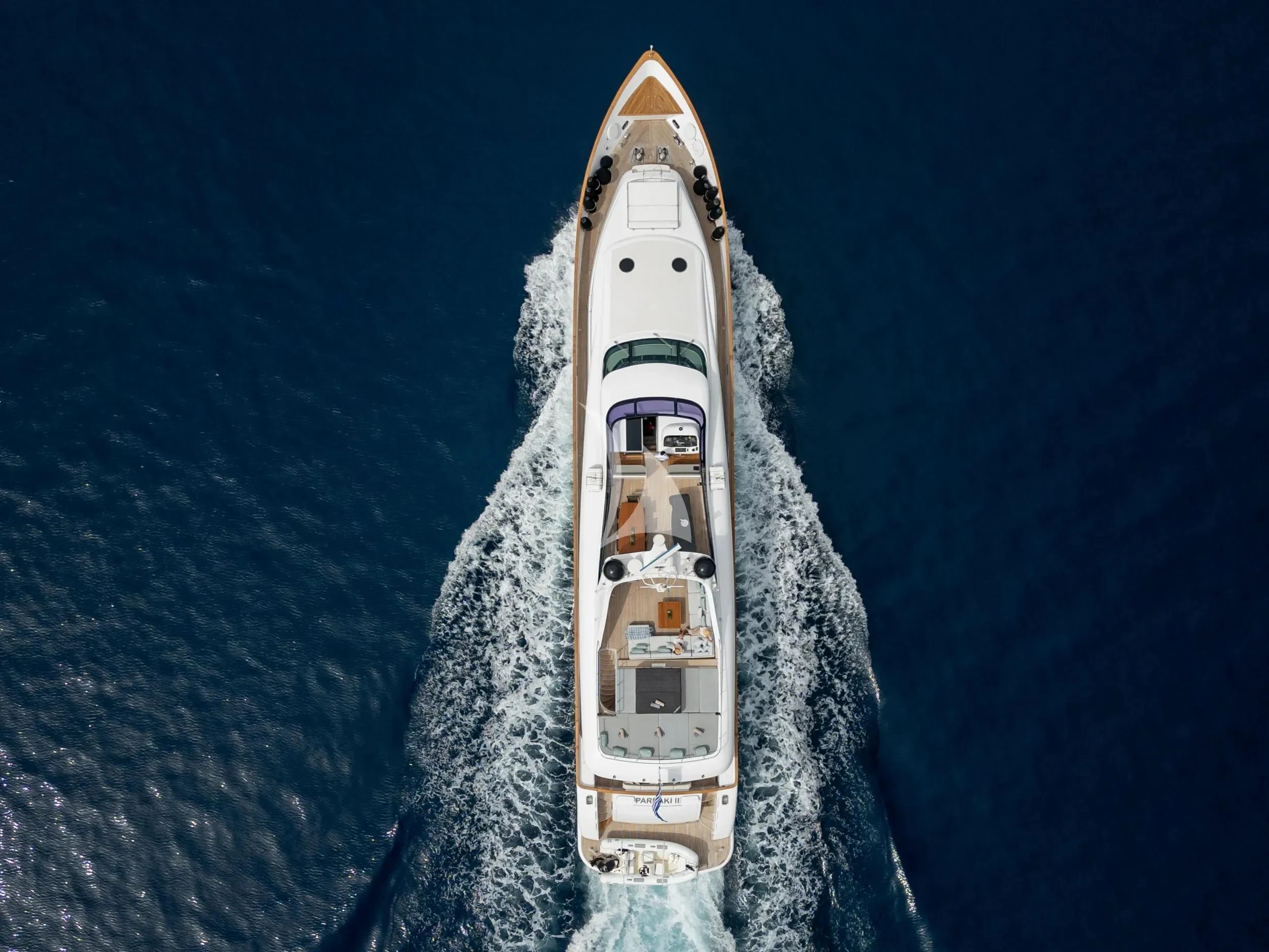 a rocket taking off from the ocean aboard PAREAKI II Yacht for Sale