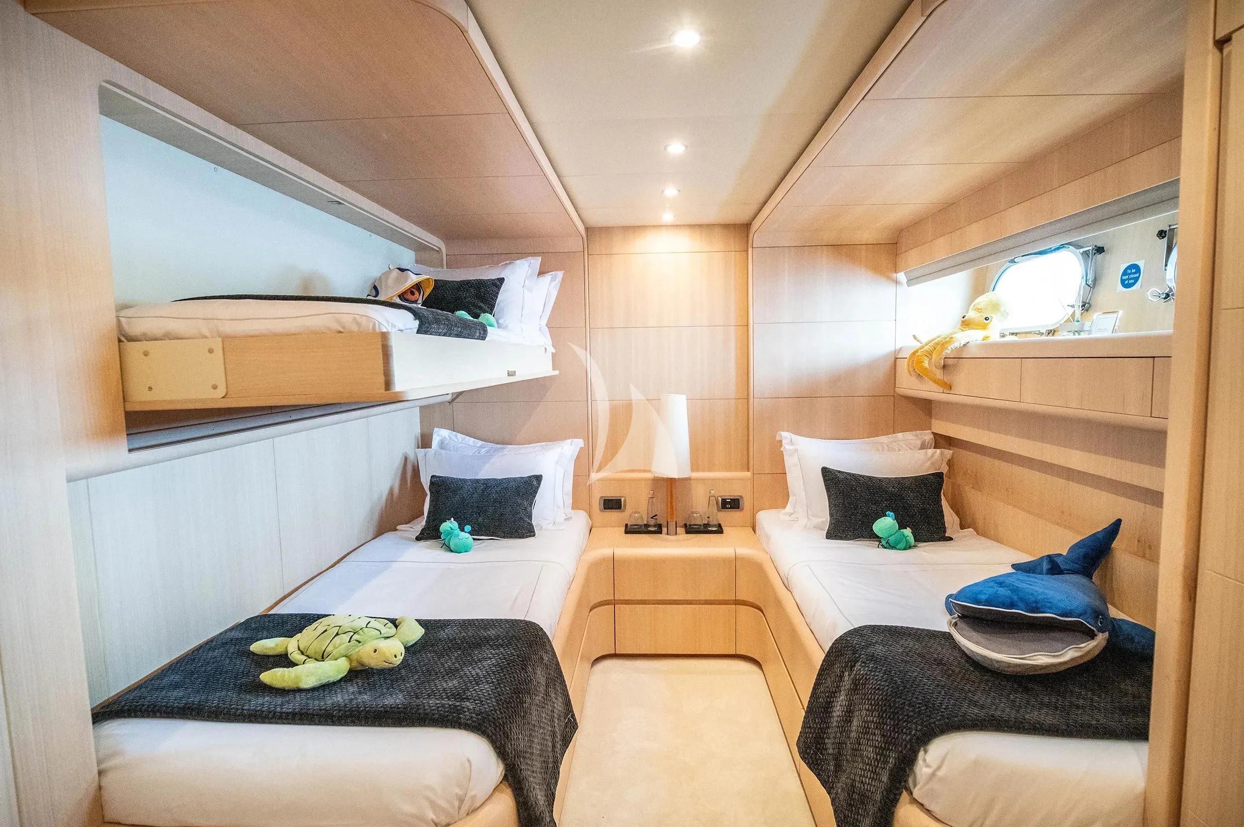a room with bunk beds aboard PAREAKI II Yacht for Sale