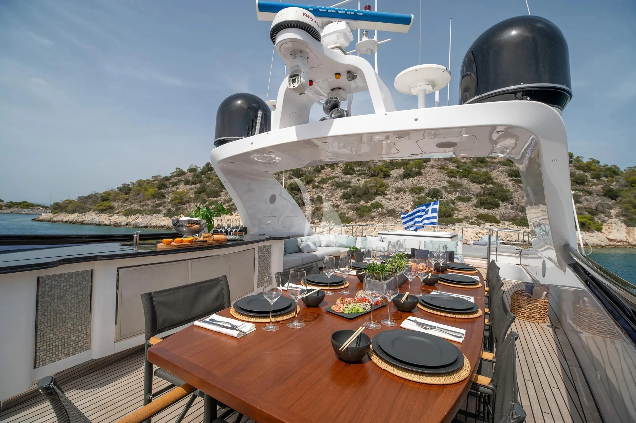 a table with food on it aboard PAREAKI II Yacht for Sale