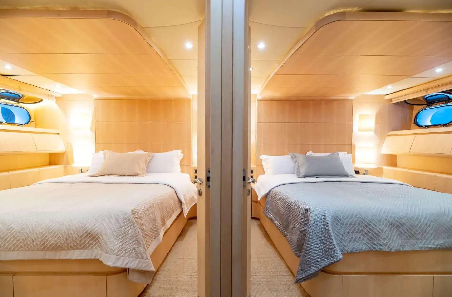 a room with two beds aboard PAREAKI II Yacht for Sale