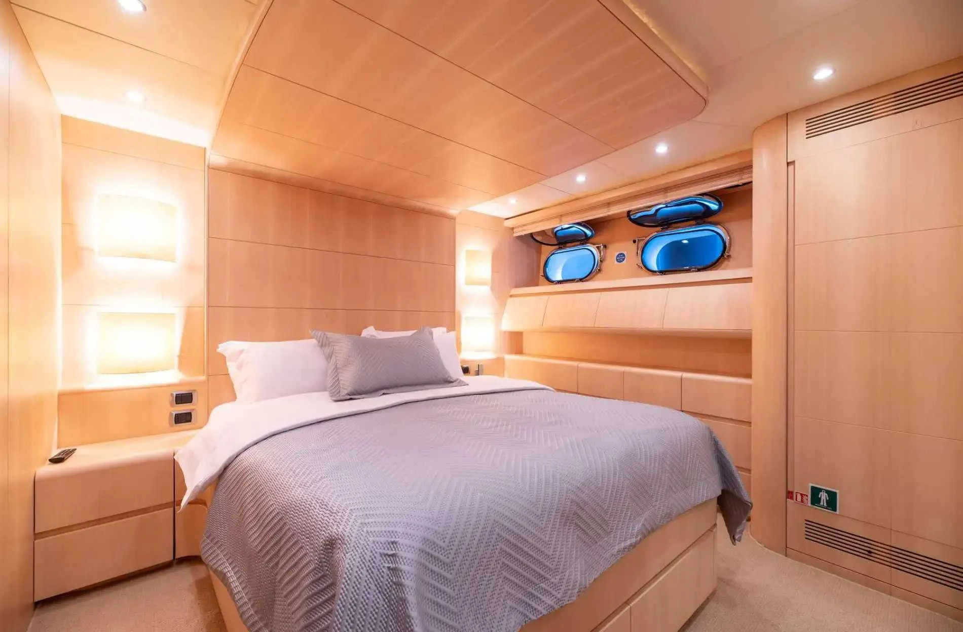 a room with a bed and a desk aboard PAREAKI II Yacht for Sale