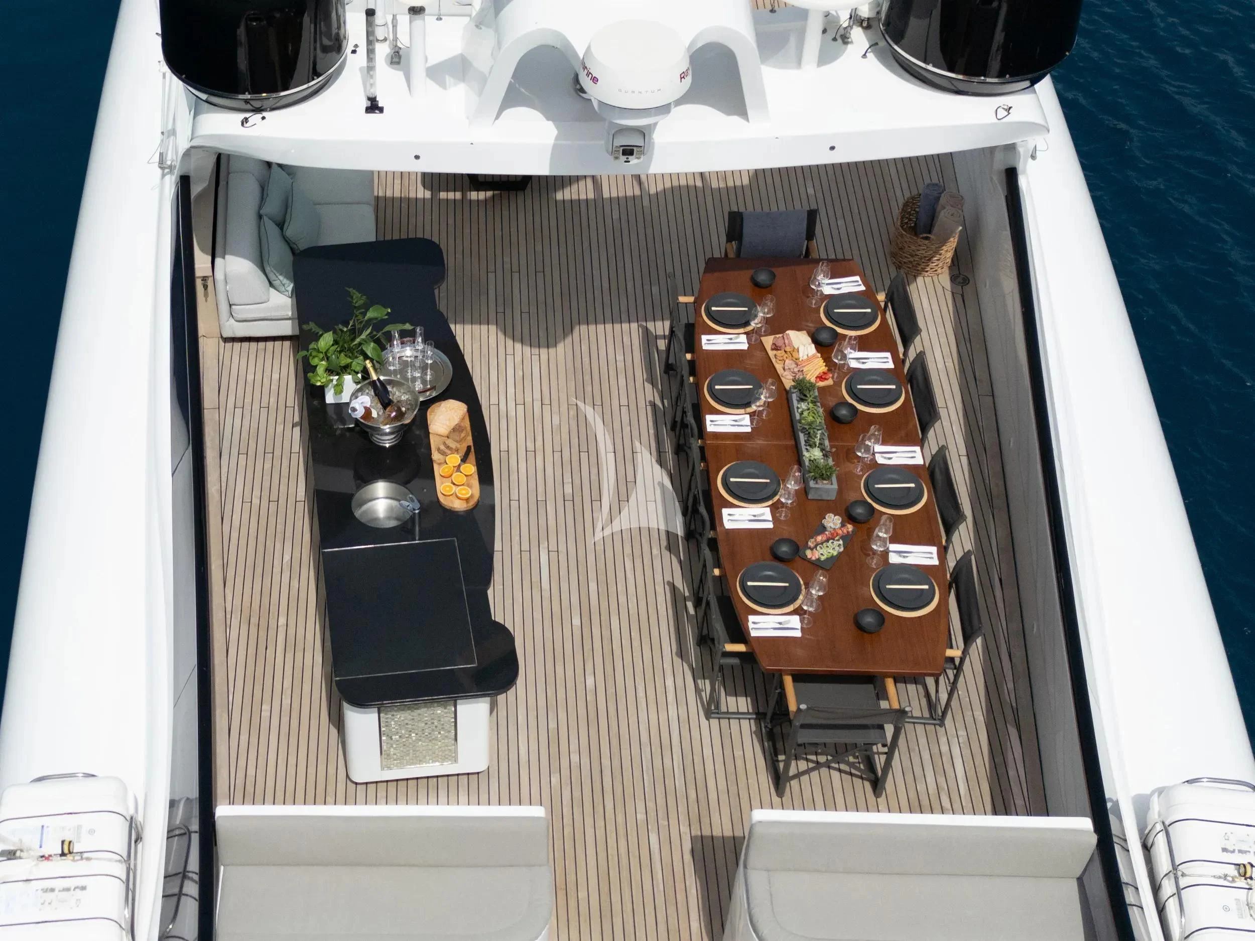 a table with a few objects on it aboard PAREAKI II Yacht for Sale