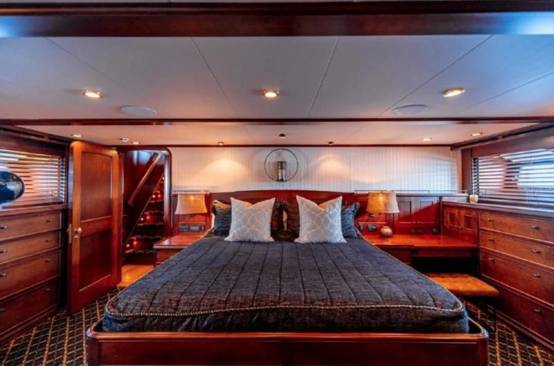 a bed in a room aboard HER IDEA Yacht for Sale