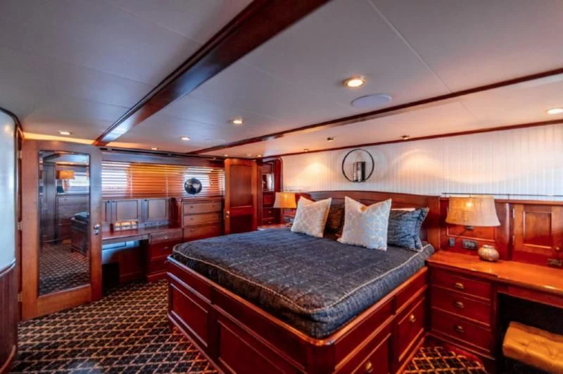 a bed in a room aboard HER IDEA Yacht for Sale