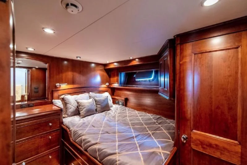 a bed in a room aboard HER IDEA Yacht for Sale