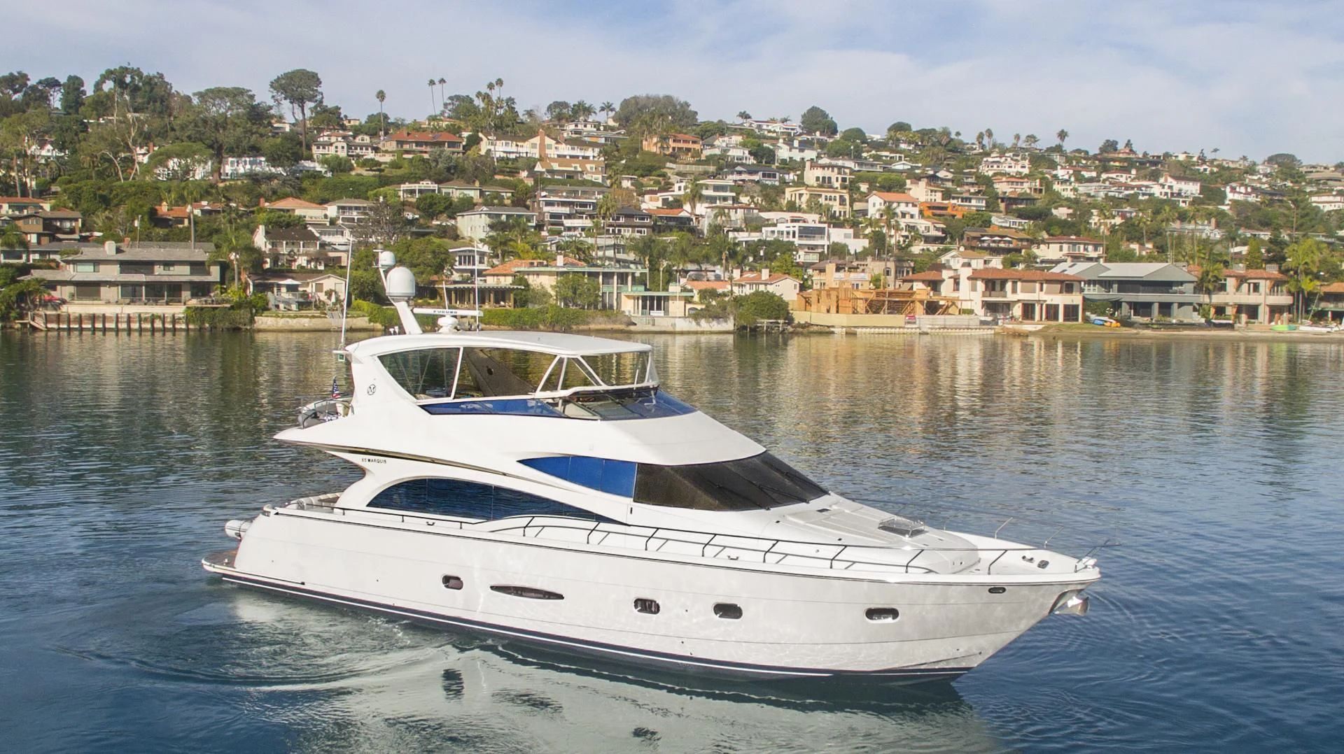 a white yacht in the water aboard MONDRIAN Yacht for Sale
