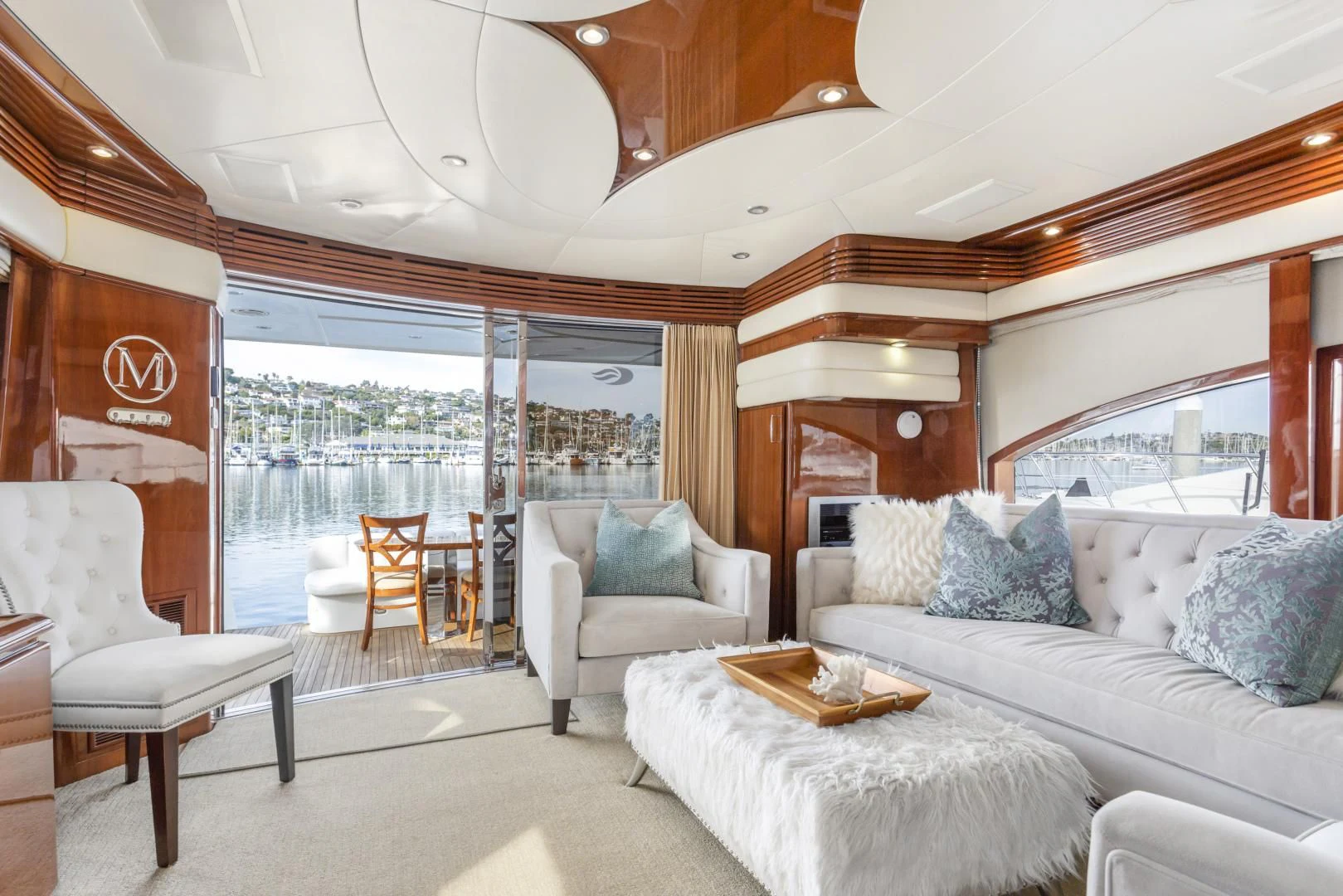 a living room with a large window aboard MONDRIAN Yacht for Sale