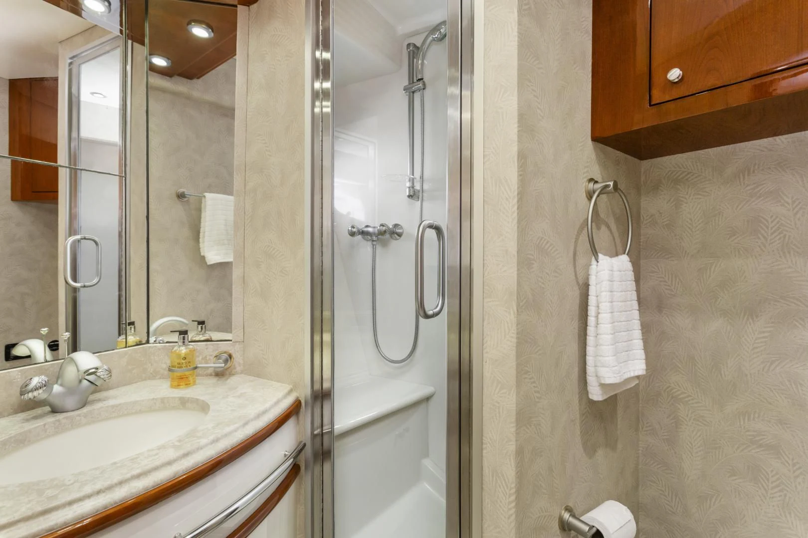 a bathroom with a shower unit and sink aboard MONDRIAN Yacht for Sale