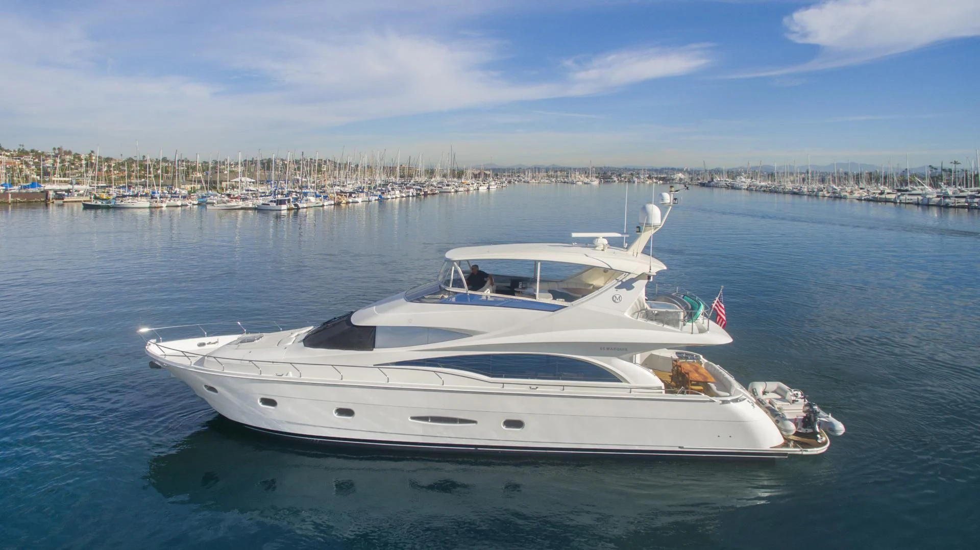 a white yacht in the water aboard MONDRIAN Yacht for Sale