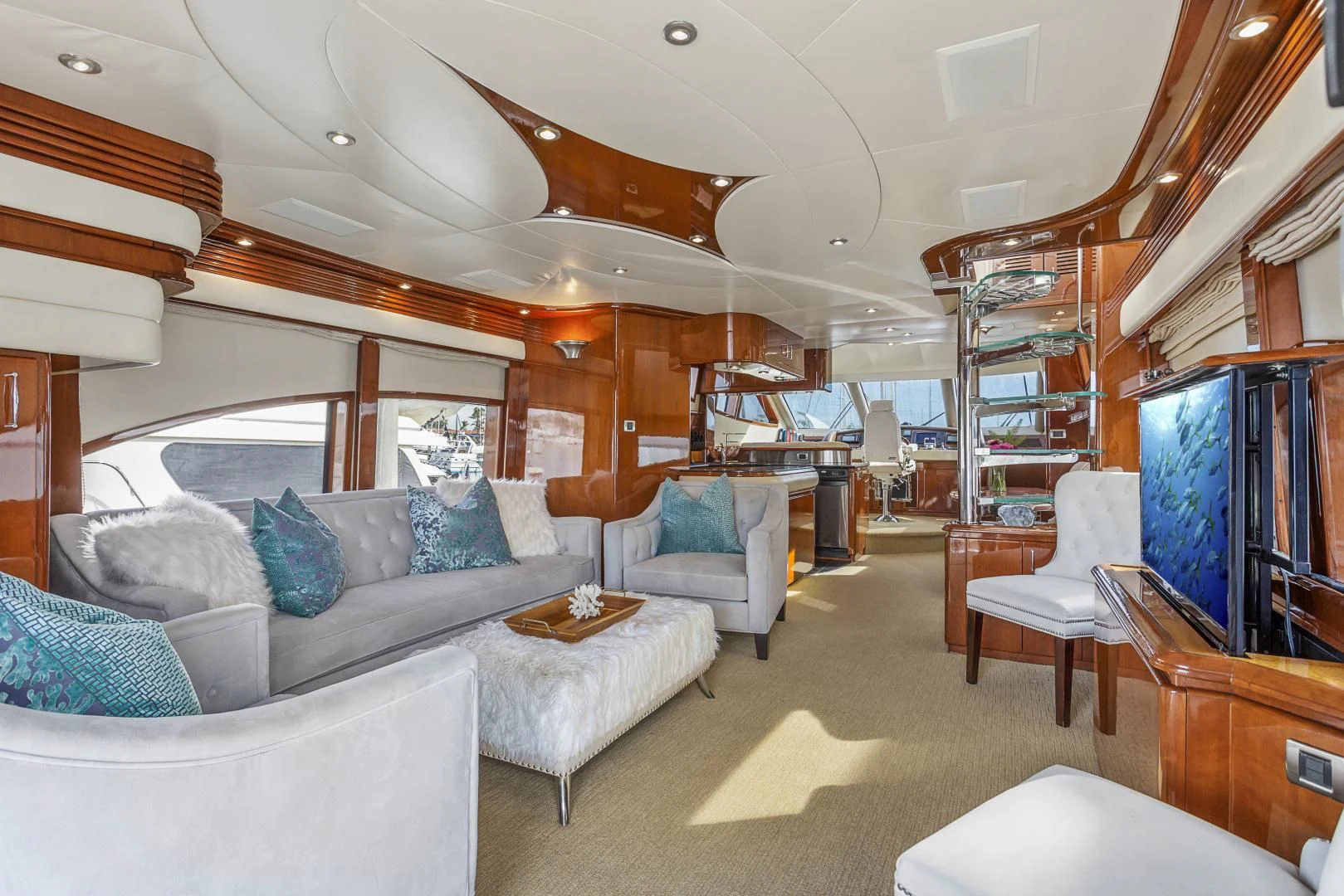 a living room with a large bed aboard MONDRIAN Yacht for Sale