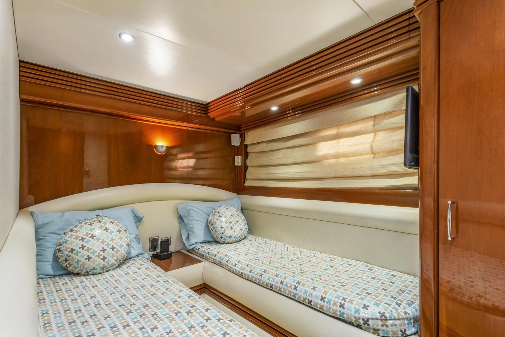 a couple of beds in a room aboard MONDRIAN Yacht for Sale