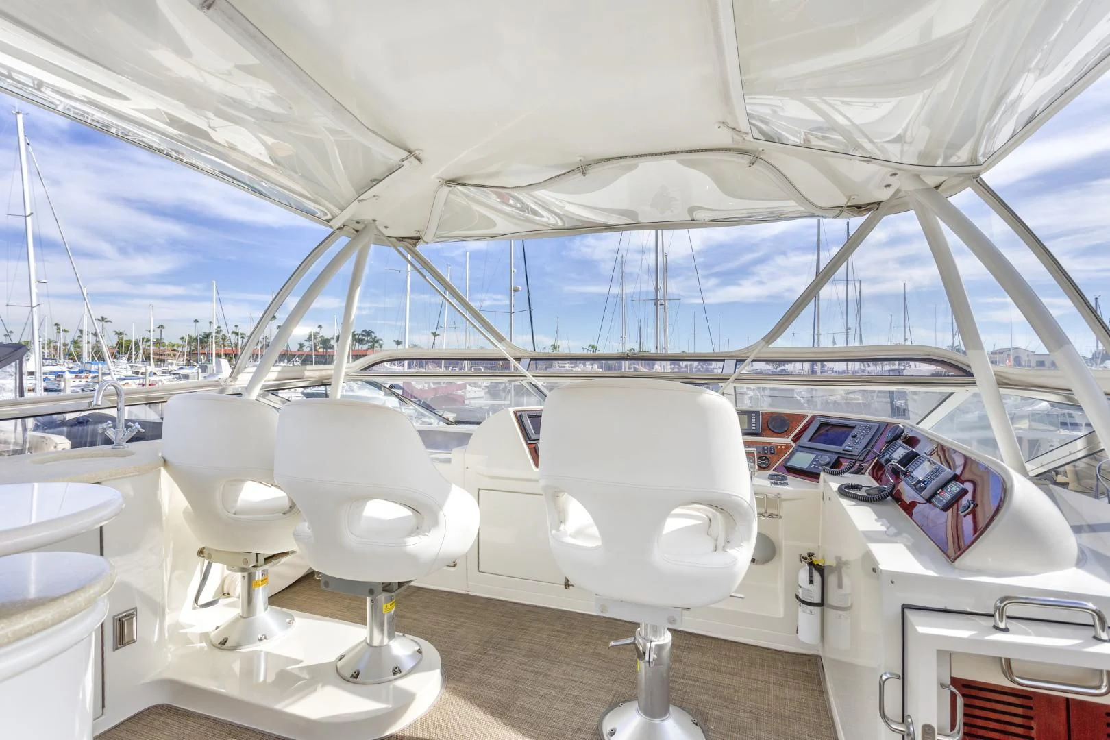 a white tent with chairs and tables aboard MONDRIAN Yacht for Sale
