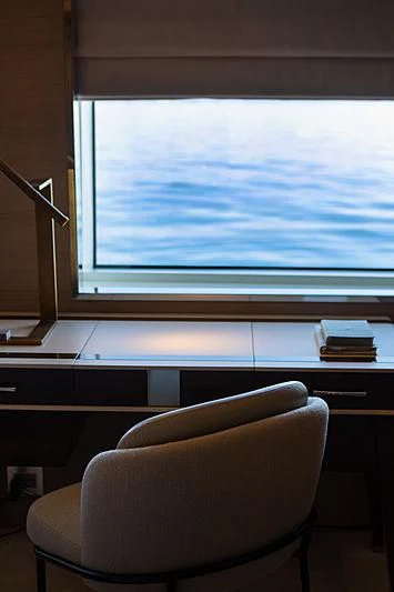 a chair in front of a window aboard MONT-AL LAWZ Yacht for Sale