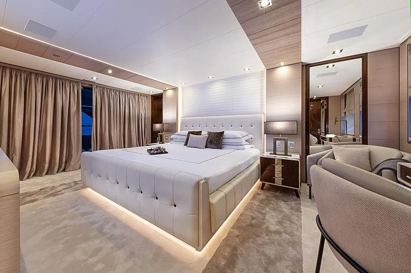 a large bedroom with a bed aboard MONT-AL LAWZ Yacht for Sale