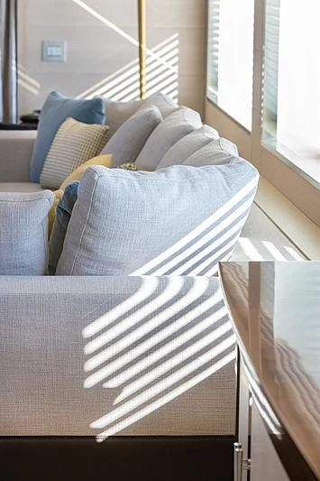 a bed with a white and blue pillow on it aboard MONT-AL LAWZ Yacht for Sale