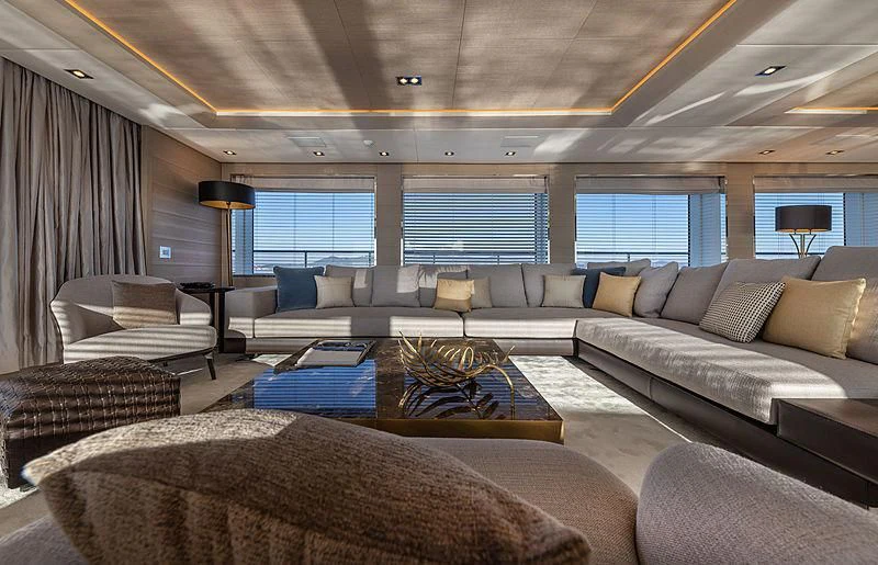 a living room with a large sofa and a coffee table aboard MONT-AL LAWZ Yacht for Sale