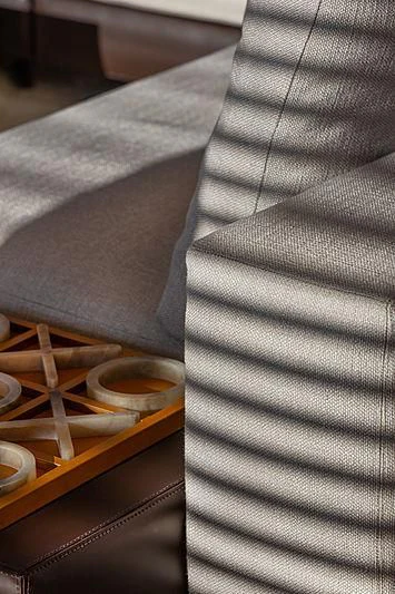 a person's legs in a grey sock next to a guitar aboard MONT-AL LAWZ Yacht for Sale