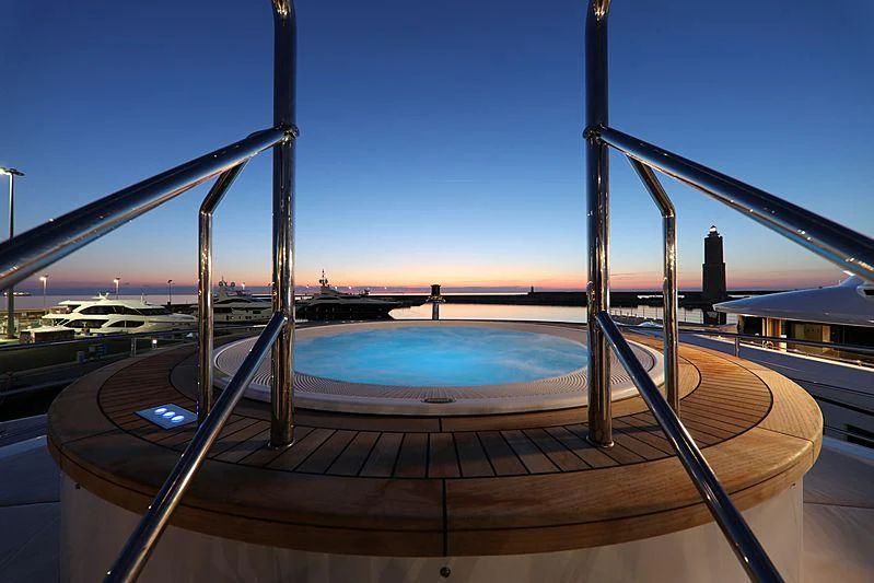 a pool with a view of a city and water aboard MONT-AL LAWZ Yacht for Sale