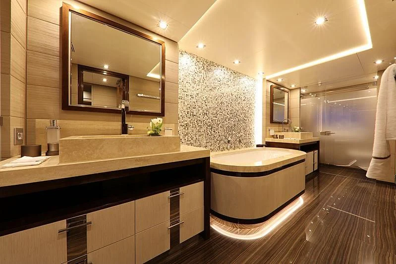 a bathroom with a large mirror aboard MONT-AL LAWZ Yacht for Sale