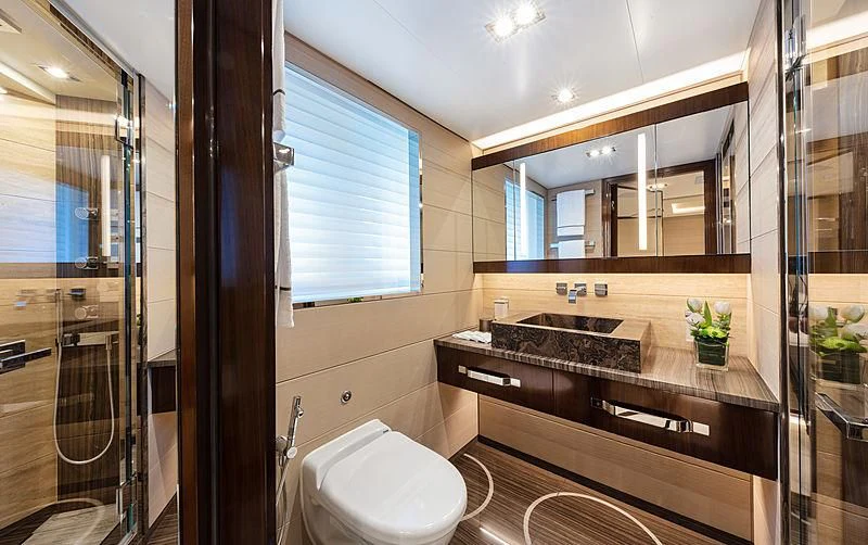 a bathroom with a sink and a toilet aboard MONT-AL LAWZ Yacht for Sale