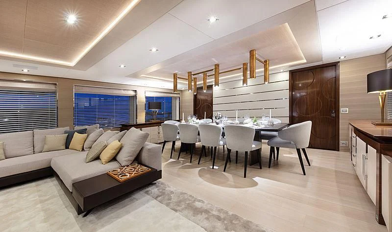 a living room with a couch and a table aboard MONT-AL LAWZ Yacht for Sale