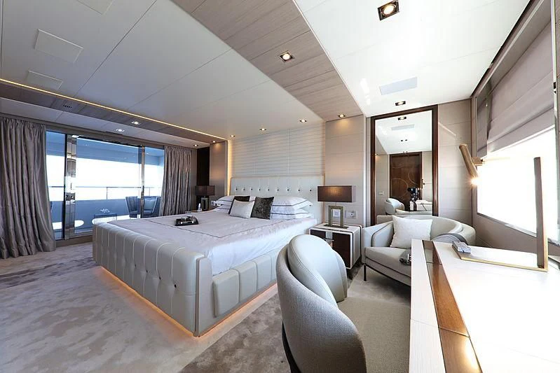 a bedroom with a bed and a desk aboard MONT-AL LAWZ Yacht for Sale