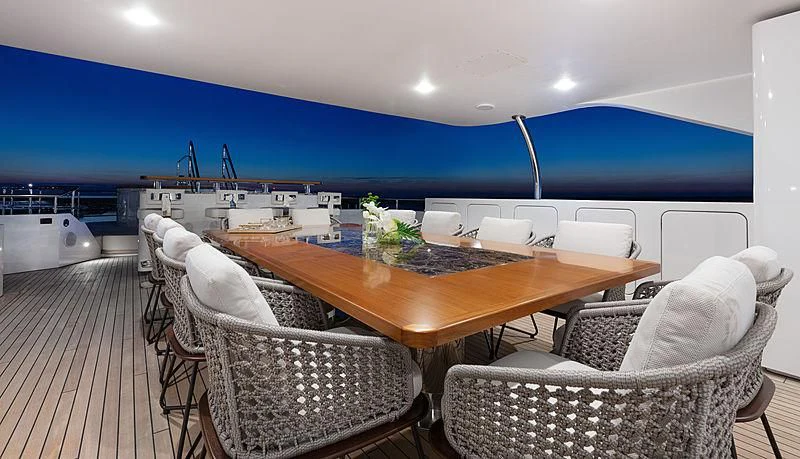 a room with a table and chairs aboard MONT-AL LAWZ Yacht for Sale