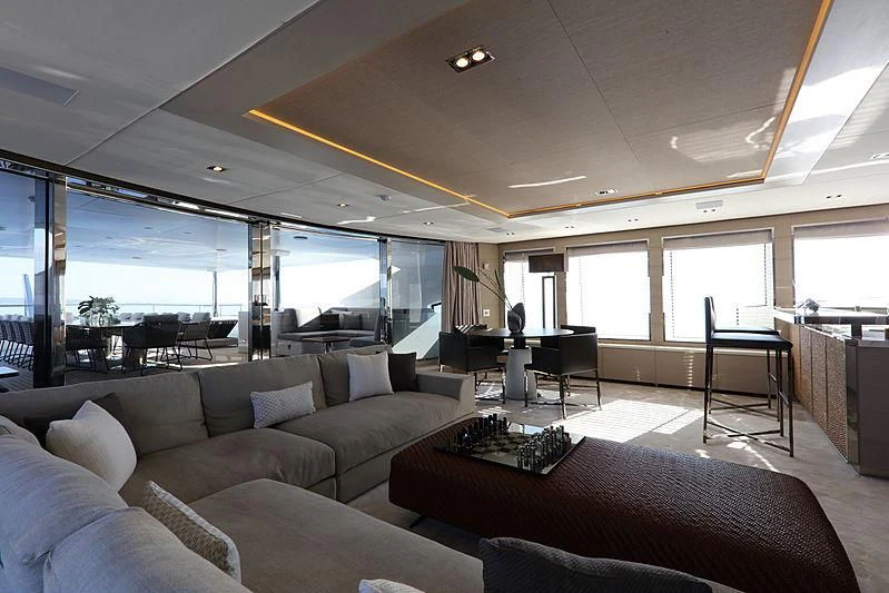 a living room with a large window aboard MONT-AL LAWZ Yacht for Sale