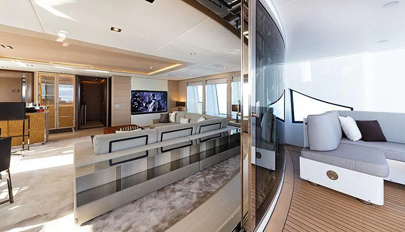 a living room with a large couch aboard MONT-AL LAWZ Yacht for Sale