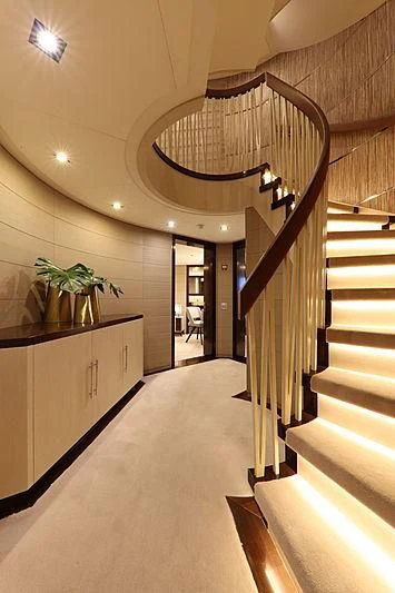 a hallway with a chandelier and a plant on the ceiling aboard MONT-AL LAWZ Yacht for Sale