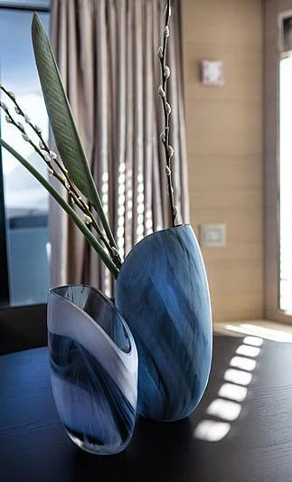 a blue flower in a vase aboard MONT-AL LAWZ Yacht for Sale