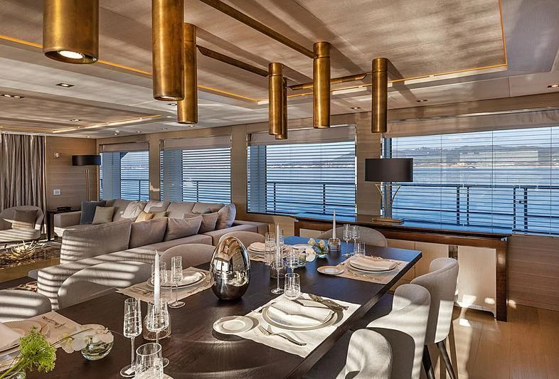 a dining table in a room aboard MONT-AL LAWZ Yacht for Sale