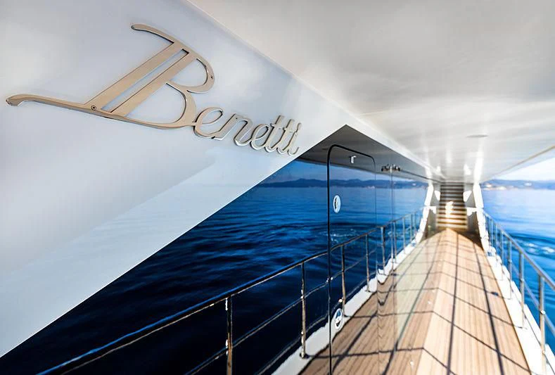 a deck with a railing and a railing with a railing and a building in the background aboard MONT-AL LAWZ Yacht for Sale