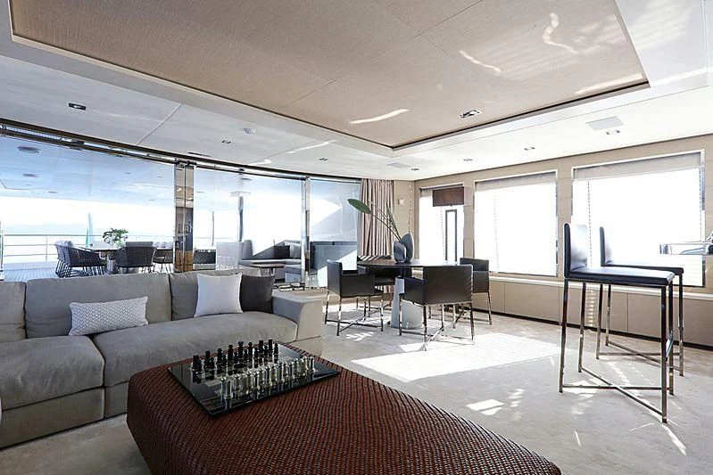 a living room with a large window aboard MONT-AL LAWZ Yacht for Sale