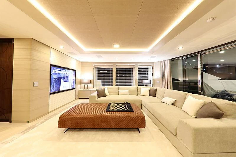 a living room with a large tv aboard MONT-AL LAWZ Yacht for Sale
