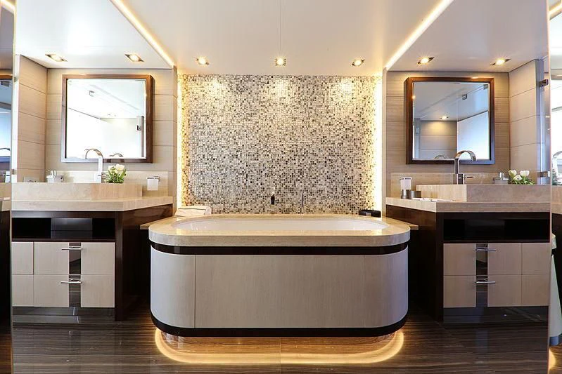 a bathroom with a large tub aboard MONT-AL LAWZ Yacht for Sale