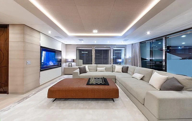 a large living room with a large tv aboard MONT-AL LAWZ Yacht for Sale