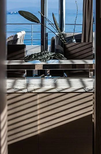 a window with a building and umbrellas aboard MONT-AL LAWZ Yacht for Sale
