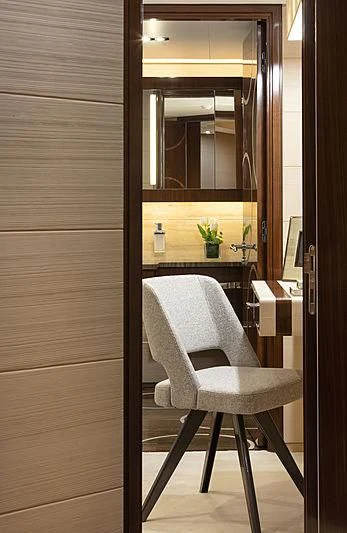 a chair in a room aboard MONT-AL LAWZ Yacht for Sale