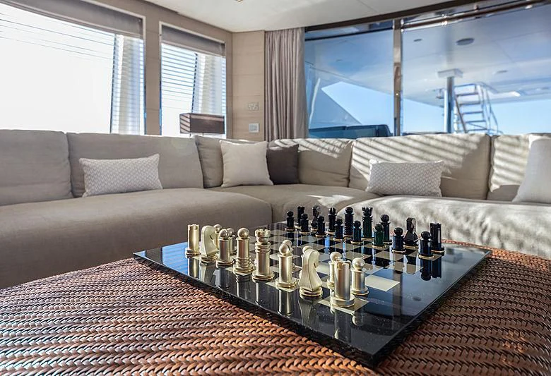 a large living room with a large table and a large window aboard MONT-AL LAWZ Yacht for Sale