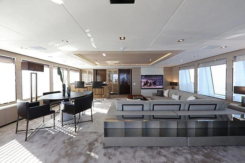 a room with a table and chairs aboard MONT-AL LAWZ Yacht for Sale