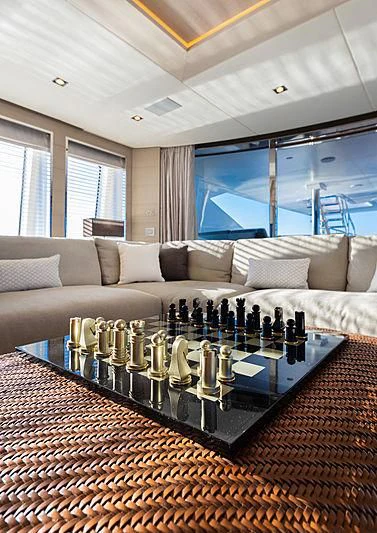 a large room with a table and chairs aboard MONT-AL LAWZ Yacht for Sale