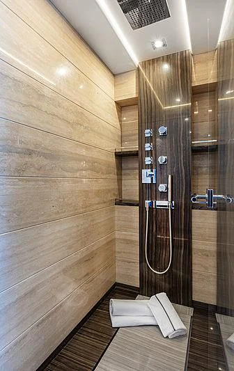 a wood wall with a shower aboard MONT-AL LAWZ Yacht for Sale