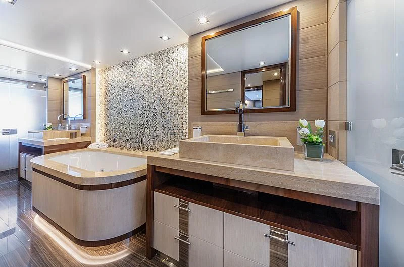 a bathroom with a large tub aboard MONT-AL LAWZ Yacht for Sale