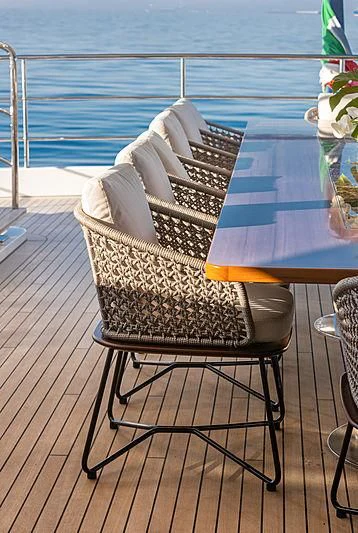 a chair on a deck overlooking the ocean aboard MONT-AL LAWZ Yacht for Sale