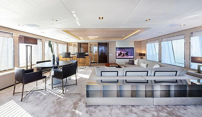 a room with a table and chairs aboard MONT-AL LAWZ Yacht for Sale