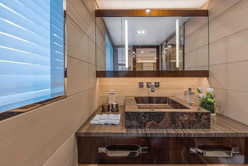 a bathroom with a large mirror aboard MONT-AL LAWZ Yacht for Sale
