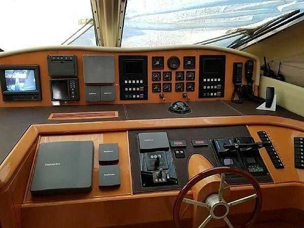 a table with many electronic devices aboard TIFFANY Yacht for Sale