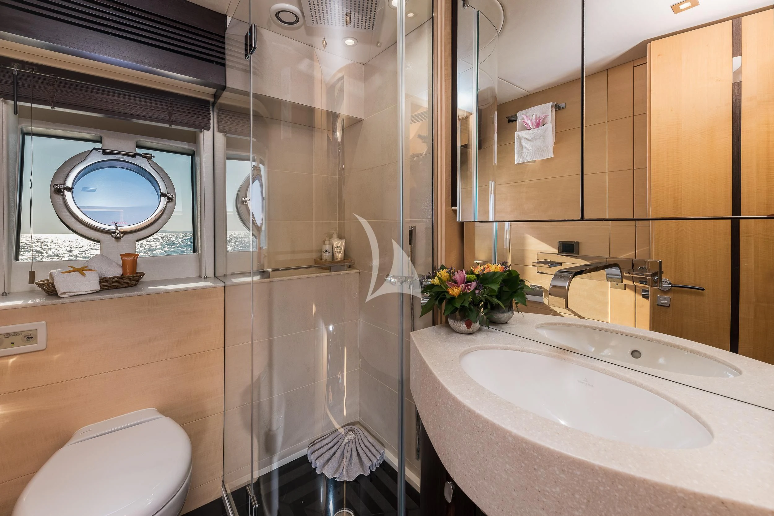 a bathroom with a tub sink and toilet aboard SEAWATER Yacht for Sale